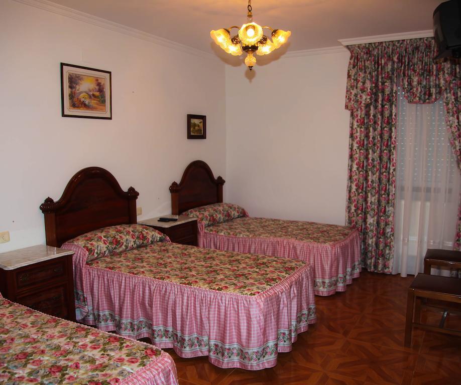 Los Dos Alemanes Melide Habitación foto